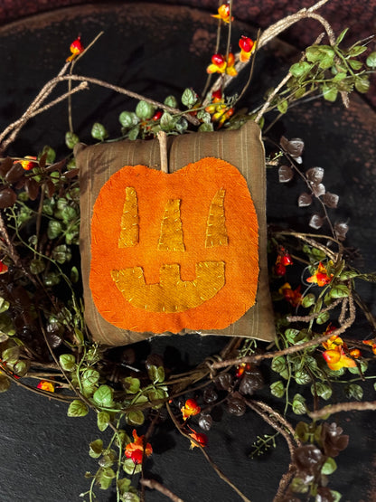 Jack-o’-lantern Pillow Fall
